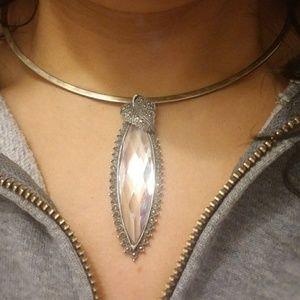 Sterling Silver clear stone w/ decorative leaf